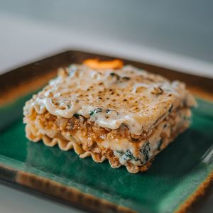 Layers of our natural pomodoro sauce with soy protein, white sauce with spinach and local mushrooms, pasta sheets and mozzarella or vegan cheese. 
 at Color Nativo in Puerto Varas