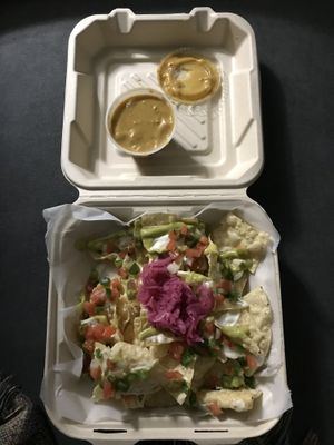 Chips n queso! The vegan sour cream is v good. Love how they garnished it  at Lick It Up - Webberville Rd in Austin