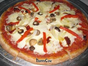 Enjoy our delicious and healthy pizzas.  at Peace n Loaf in San Juan