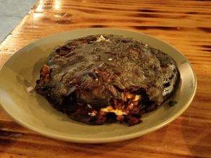Delicious chicharrón gordita with cheese at Mictlan Antojitos Veganos in Mexico City