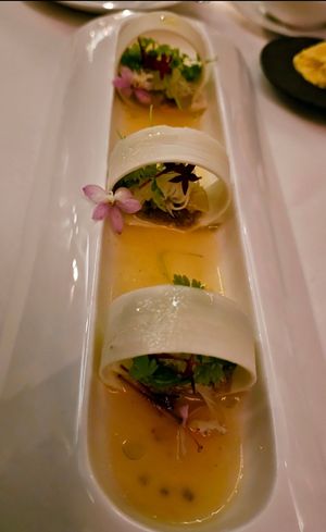 Heart of Palm Salad: pickled green papaya, golden kiwi vinaigrette, toasted coconut, sesame & almond, feta at Elizabeth's in Washington