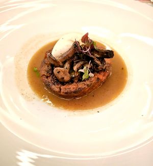 Spring Pea & Mushroom Roulade: tri peppercorn-cognac sauce,  jungle plum, truffle quenelle, porcini mushroom at Elizabeth's in Washington