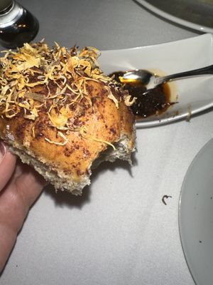 Bread topped with saffron.  So good   at Elizabeth's in Washington