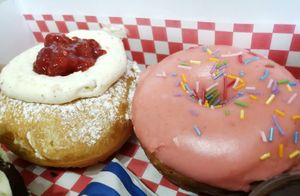 Jam and cream doughnut and stawberry glazed and sprinkled doughnut at Future Doughnuts in Bristol
