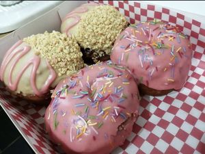Pink iced doughnuts, and PB&J doughnuts at Future Doughnuts in Bristol