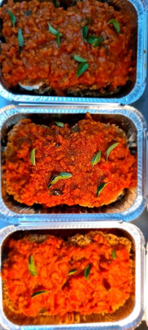 Berinjela e abobrinha empanadas na chia, cream cheese @vegseedartesanal ao molho à bolonhesa caseiro. at Umami Gastronomia in Sao Paulo