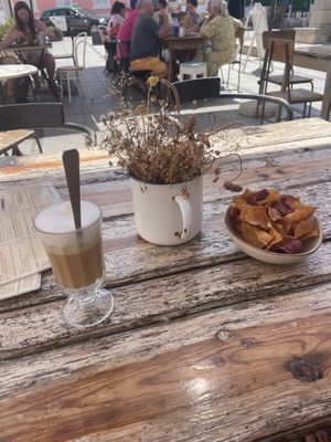 Vegan oat latte and sweet potato chips  at Ao Largo in Odeceixe