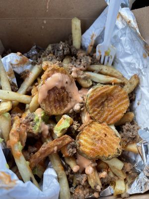 Fried pickles on loaded fries   at Solár: A Vegan Eatery in Tempe