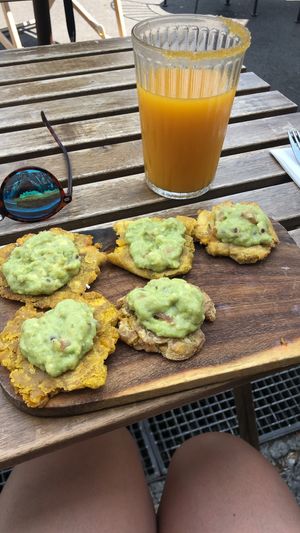 Vegan (custom) tostones with a mango michelada  at LUCHA LIBRE in Lausanne