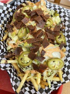 Mosh pit fries with bacon and jalapeños added   at FRANCIS in Minneapolis