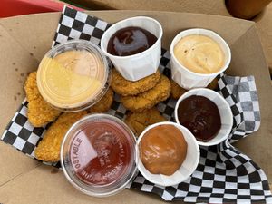 Impossible Nuggets with extra dipping sauces to try   at FRANCIS in Minneapolis