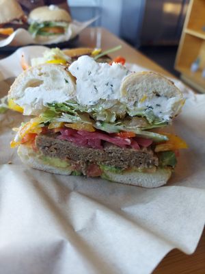 Vegan Very Veggie (Signature Sando) with added vegan sausage at Seize The Bagel - Cascade Park in Vancouver