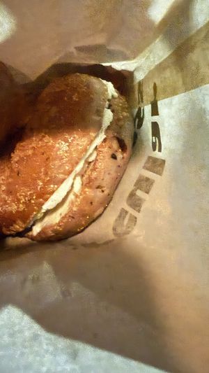 Thick portions of cream cheesee  at Seize The Bagel - Cascade Park in Vancouver