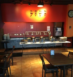 Buffet and dining area at The Hyderabad Indian Grill in Bloomington