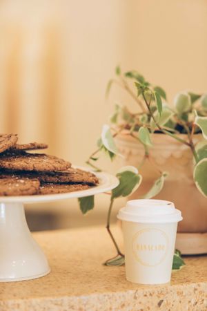Sea salt tahini chocolate chip cookies & take away coffee in bagasse cup  at Banacado in Stockholm