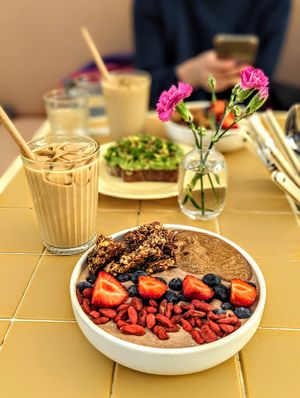 Iced latte, smoothie bowl and avocado toast at Banacado in Stockholm
