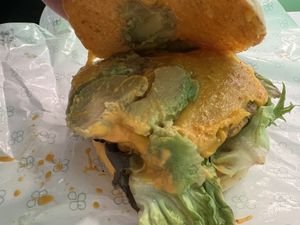 Avostack burgers with vegan cheese $17.80  at Quick Greens - Funan Ctr in Central Singapore