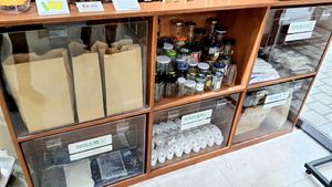 collection of recyclable items: paper bags, ice packs, glass etc. at Jigushop - Yeonnam District 지구샵 홈&베이커리 연남점 in Seoul