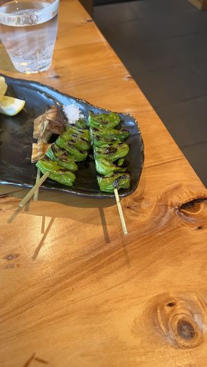 Shishito peppers and half eaten trumpet mushrooms   at Izakaya Gama in Point Arena