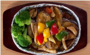 鐵板燒汁釀茄子 at Happy Veggies - Wanchai in Hong Kong Island