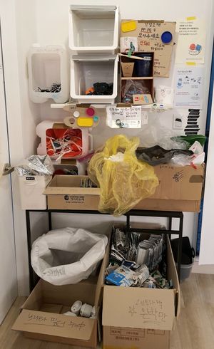 containers for recyclable materials at Almang Market in Seoul