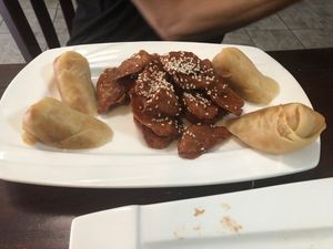 L12 sesame chicken light sauce with spring roll   at CoCo Lin Vegetarian House in Ridgewood