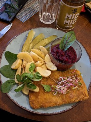 Vegan schnitzel with beetroot, baked potatoes and a dill pickle at Wegeneracja in Opole
