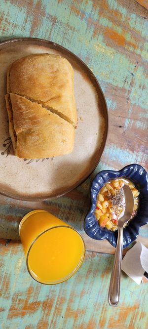 Ciabatta, fruit salad and juice at Sow Cake Lounge in Sao Paulo