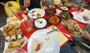 Variety of food (not all vegan / vegetarian on this picture though )  at Beirut in Paradiso