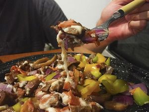 Alambre : Juicy combination of seitan and soy steak, soy and wheat bacon, mushrooms, bell pepper, onion and vegetable cheese.  at Viva la Virria in Merida