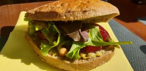 Vegan sandwich with artichoke cream, beetroot, chickpeas and salad at Bistrot Don Carlo Delicatessen in Bosa