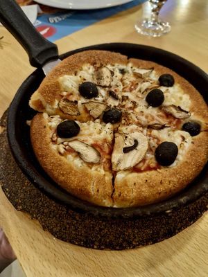 Vegan pan olive and mushroom pizza at Pizza Hut in Funchal