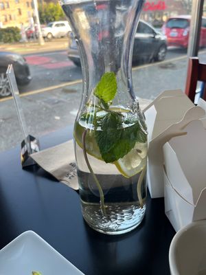 Mint and lemon water. Nice touch!  at Cashew Thai Cuisine in Seattle