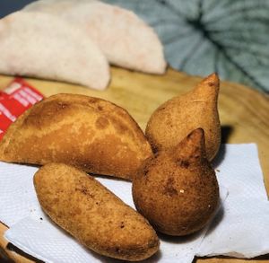 Risole de soja, coxinha de carne de jaca e enroladinho de “salsicha” com massa de batata at Lanche Veg in Maceio