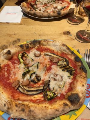 pizza with vegan cheese and vegan sausages  at Rossopomodoro - Milano Centrale in Milan