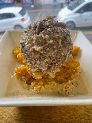 VEGAN HAGGIS - lentil "meat mixture" on top of mashed regular and sweet potatoes on a bed of whiskey and mustard gravy. at The Haggis Box in Edinburgh