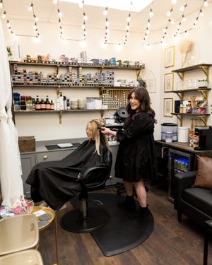 Owner & stylist, Anya Sudarkina  at Gloss Hair Lounge in Seattle