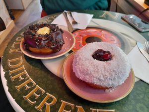 Cookie cream and coconut and cherry doughnuts at Nonna's Deliciously Different in Swansea