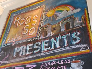 Happy greeter reader board shared vegan options at Picasso Cafe on Paseo in Oklahoma City