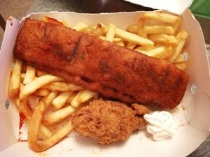 Fish and chips and 1 chicken drumstick (watch out for the "bone") at Veggie Master Chef in Leicester