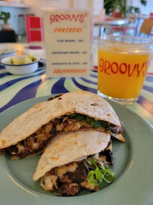 the "Totallity" (my favorite thing on the menu, it has a little bit of each type of filling!) at Groovy's Taqueria Vegana in Mexico City