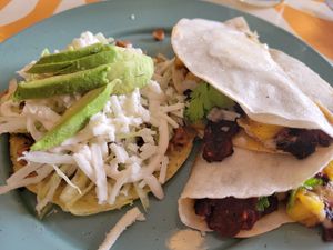 tostada on the left; gringa de pastor on the right at Groovy's Taqueria Vegana in Mexico City