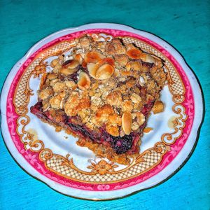 almond berry crumble (gluten free) at Pink Peacock די ראָזעווע פּאַווע in Glasgow