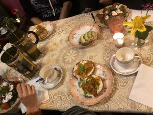 Special salad, herbal teas, plain & cinnamon raisin baygles with cashew cream cheese & carrot lox, baygle with hummus & avocado, hot apple cider and pink lemonade!  at Pink Peacock די ראָזעווע פּאַווע in Glasgow