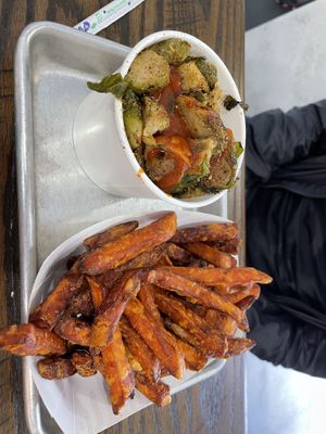Side of brussel sprouts and side of sweet potato fries  at Pure Vegan Cafe in Raleigh