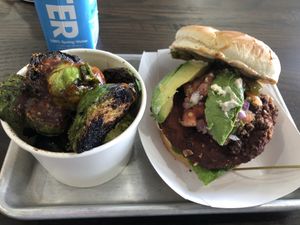 Chipotle chicken sandwich w/ Brussels sprouts.  at Pure Vegan Cafe in Raleigh