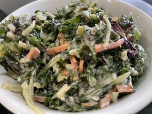 Kale Cole slaw w/Brussels sprouts. Too much dressing!  at Pure Vegan Cafe in Raleigh