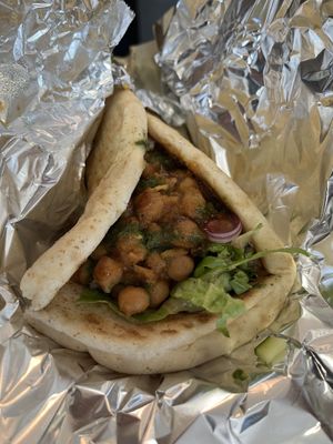 Delicious Chana masala wrap, with nice kick! (Little spicy)  at Pure Vegan Cafe in Raleigh