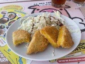 kabocha korokke (already had a bite)  at Ramen Kagura - Atocha in Madrid