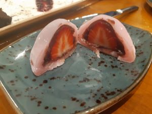 Strawberry mochi has actually a strawberry inside at Teapots in Madrid